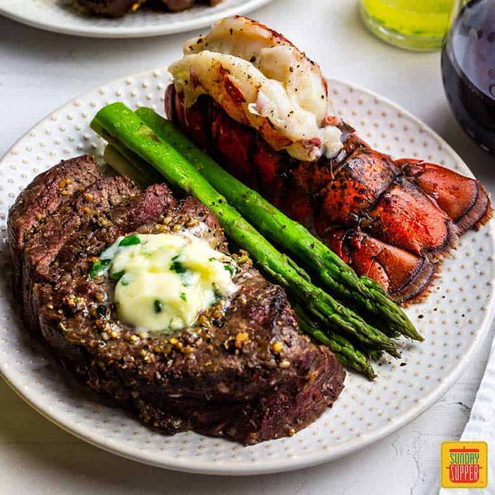 Sensual and Sumptuous: A Steakhouse-Worthy Grilled Surf and Turf with Herb Butter Recipe for Lovers